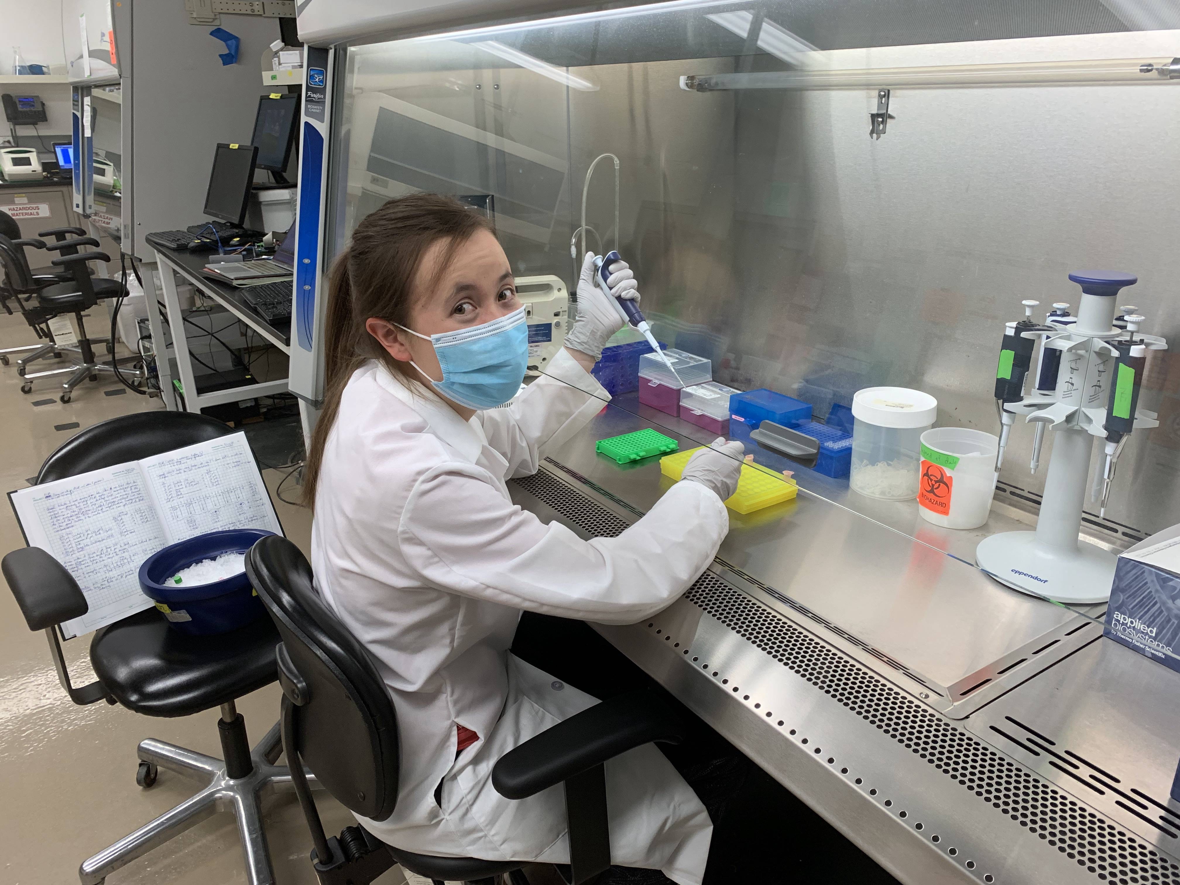 Katie Antilla working in her lab